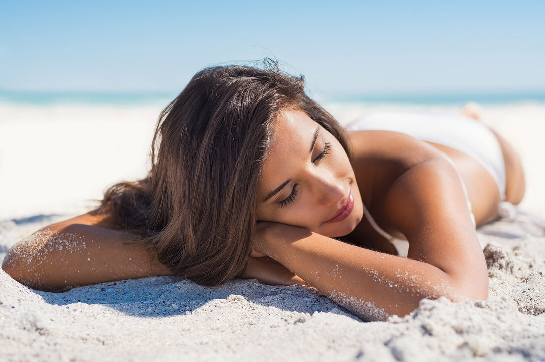 Girl relaxing on the beach