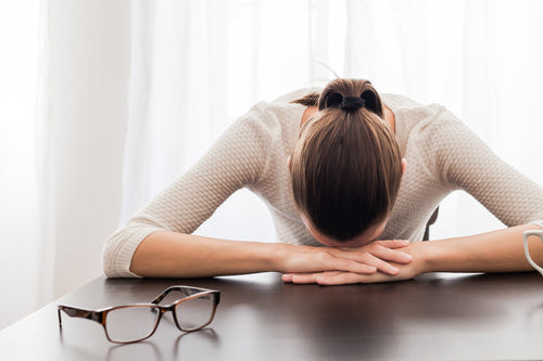 Tired woman in the office