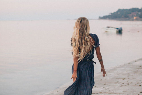 lady walking on a beach